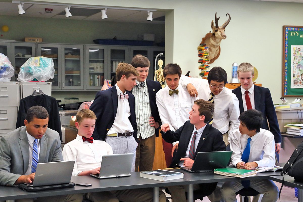 Students seated in a biology classroom during a lecture.
