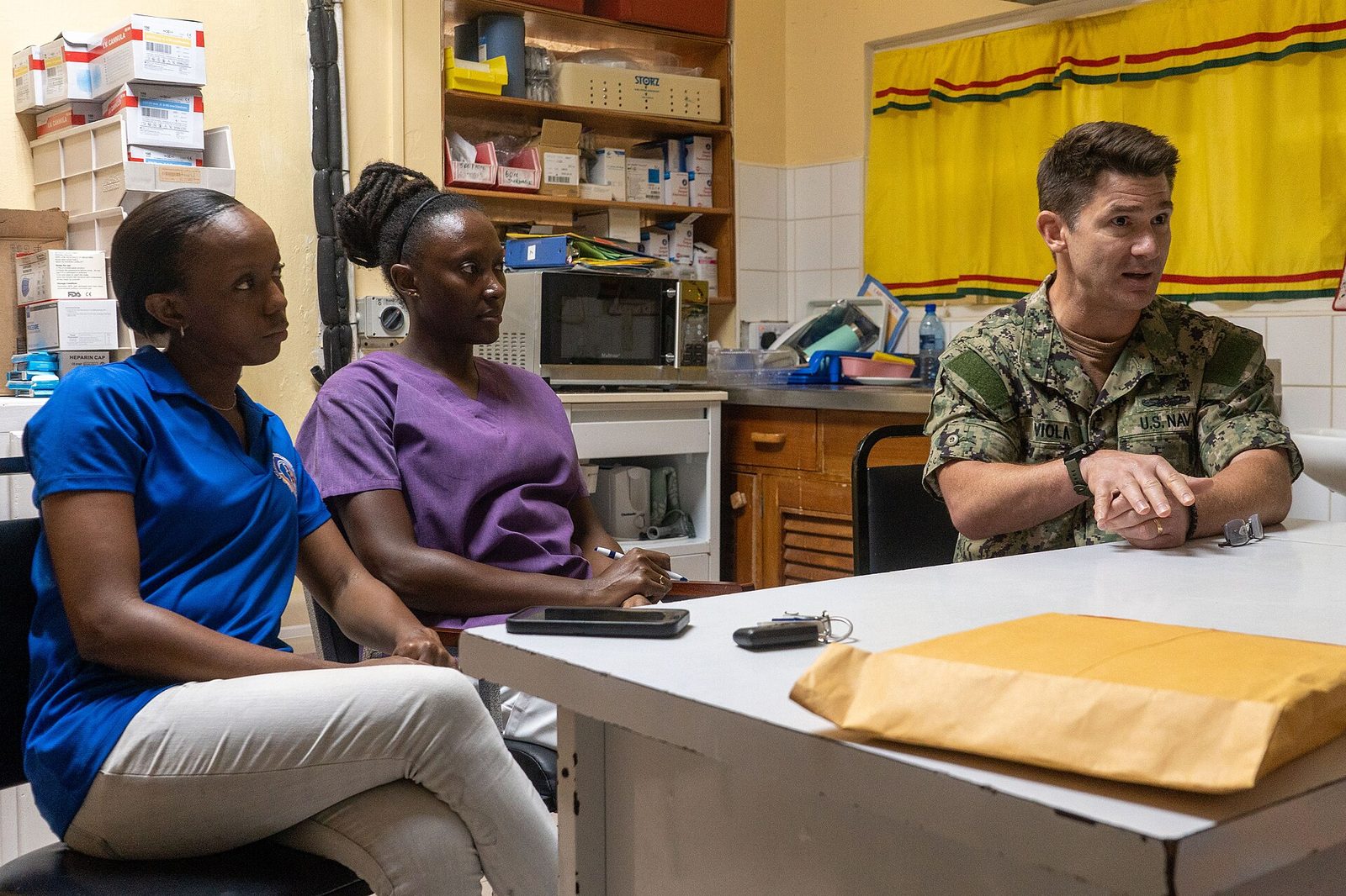 Physician discussing a diagnosis and treatment plan with a patient.