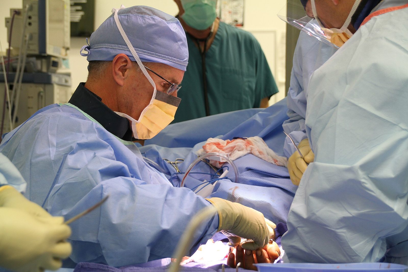 Orthopaedic surgery in progress inside a field operating room in Afghanistan.