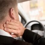 How do I know if my driving position is causing pain?