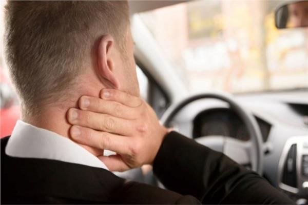 How do I know if my driving position is causing pain?