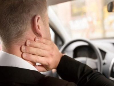 How do I know if my driving position is causing pain?